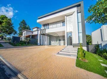 Casa · 710m² · 4 Quartos · 5 Vagas · Luxo absoluto no Alphaville Granja Viana: Mansão cinematográfica com elevador, cinema 4K e porteira