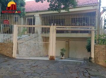 Frente+Casa.jpg+2025-04-10 · Casa 3 dormitórios à venda Santo Antônio Porto Alegre/RS