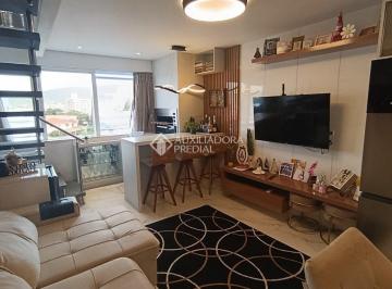 Apartamento · 64m² · 2 Quartos · 2 Vagas · Apartamento duplex à venda com 2 dormitórios no Centro de Palhoça/SC | Com churrasqueira, 2 vagas e 