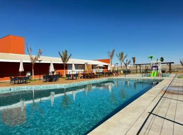 97c4d5f416cf90d3f31a05a61c5146d5d4944447 · Terreno à venda no Condomínio Reserva Novo Mundo em Uberlândia