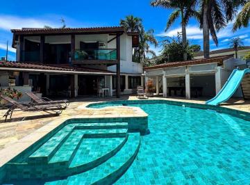 Casa · 350m² · 5 Quartos · 4 Vagas · Casa à venda no Jardim Acapulco em Guarujá com terreno de 525 metros quadrados.