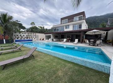 ced22439c89008f8f380496f61a6adaa0565607d · Casa frente ao mar para locação de temporada – 7 suítes, piscina, sauna e acomoda 18 pessoas