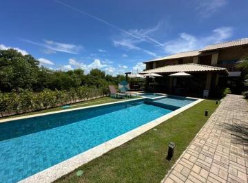 Foto 02 · Apartamento à venda no Villa das Brisas - Itacimirim, Camaçari (BA)! Refúgio à beira-mar com 2 suíte