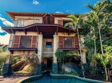 Casa · 523m² · 6 Quartos · 5 Vagas · Casa de Alto Padrão em Condomínio Exclusivo com Vista Panorâmica para o Mar