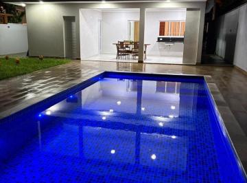 Imagem do Imóvel · Linda casa com 04 suítes, amplo jardim com piscina e espaço gourmet !!!