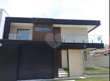 Fachada · Casa com 3 dormitórios suites a principal com hydro à venda, 243 m² por R$ 2.780.000 - Camboinhas -