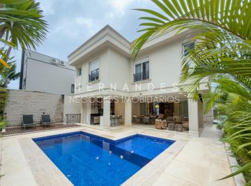 Foto 01 · Casa Neo Clássica nova em Condomínio de Luxo em Alphaville com 4 Suítes e 6 Vagas de Garagem - 442m