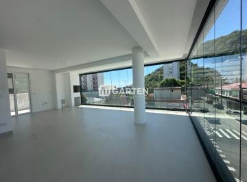 Sala · Apartamento com 3 Suítes na Praia Mansa