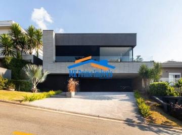 Casa · 352m² · 4 Quartos · 6 Vagas · Elegância e Sustentabilidade: Residência Exclusiva com 4 Suítes e Lazer
