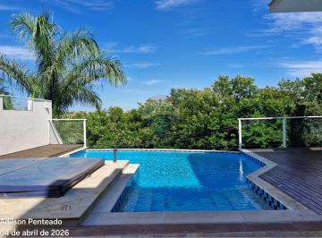 Casa · 402m² · 4 Quartos · 5 Vagas · Casa de condomínio, 4 quartos, 402 m² de área útil, piscina e segurança, para locação.