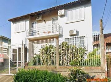 c842debd292189e9018b0caa0cabac6b1590f2e1 · Casa com 4 dormitórios para alugar, 119 m² por R$ 3.150,01/mês - Vila Nova - Porto Alegre/RS