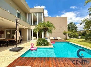 Casa · 402m² · 4 Quartos · 2 Vagas · Casa Moderna no Nova Higienópolis – 4 Sts, Piscina Aquecida e Energia Solar
