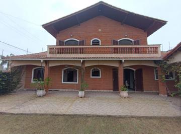 Casa de 4 quartos, Itanhaém · Casa à 150m do mar com 4 quartos e área gourmet em Itanhaém.