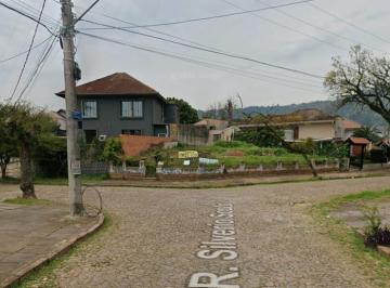 Foto da frente do terreno, vista da rua em frente. · Terreno no Teresópolis – Oportunidade Única!