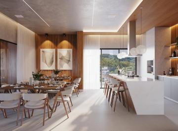 Espaço gourmet com ilha e mesa de jantar no pavimento de lazer (imagem ilustrativa) · Apartamento com 88 m², 2 dormitórios e varanda gourmet no Seventy