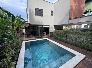9e7919b4c5d9eefb7949f0eacdcb709e44bb85cd · Casa em condomínio em Camburi | 3 suítes | Vista para a mata | 2 vagas cobertas