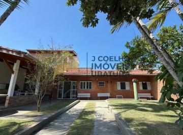 Foto 01 · Linda casa para locação definitiva na Praia das Toninhas, em Ubatuba, a poucos passos do mar.