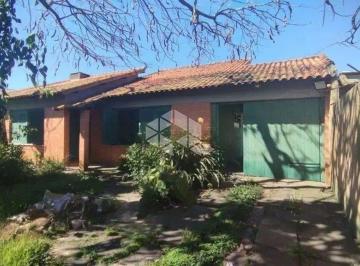 Casa · 258m² · 3 Quartos · 3 Vagas · Casa com Edícula, Amplo Terreno e Ótima Localização Próxima à Orla do Guaíba