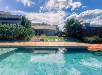 6d36f259d5d24516b4b657e693f31ec63aa4a6cf · Casa com 4 dormitórios à venda no condomínio Punta Del Este, 272 m² por R$ 4.500.000,00 - Sertaneja/