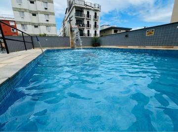 Apartamento · 67m² · 2 Quartos · 1 Vaga · Apartamento à Venda nas Astúrias, Guarujá – Edifício com Piscina e Lazer