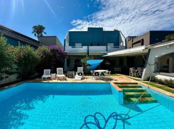 51e82fb662688af3654919dbf7c68fcab93a766a · Casa à venda no Condomínio Jardim Acapulco no Guarujá | Omega Imóveis
