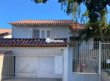 Casa · 125m² · 3 Quartos · 2 Vagas · Casa com Duas Residências e Pátio Amplo no Bairro Tranquilo