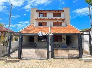 .jpg+2025-03-04 · Casa em Porto Alegre, no bairro Tristeza, com 3 dormitório(s), e 3 banheiros, à