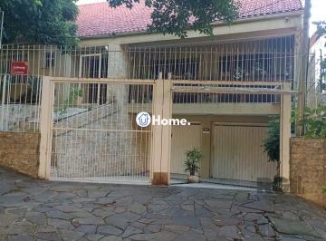 Frente+Casa.jpg+2025-04-10 · Casa 3 dormitórios à venda Santo Antônio Porto Alegre/RS