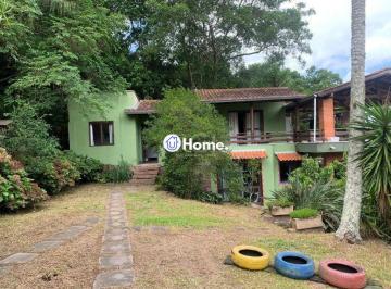 Casa · 200m² · 3 Quartos · 4 Vagas · Terreno de 5.280 m², com 3 casas, no bairro Ponta Grossa, em Porto Alegre.