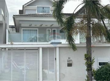 Casa · 370m² · 4 Quartos · 2 Vagas · Luxo e Conforto no Condomínio Riviera del Sol!