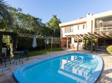 Casa · 270m² · 3 Quartos · 4 Vagas · 3 suítes com vista para o Guaíba
