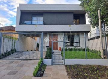 Casa · 132m² · 2 Quartos · 3 Vagas · Linda casa de alto padrão com 2 suítes à venda na Vila Ipiranga em Porto Alegre com 131,93 m² de áre
