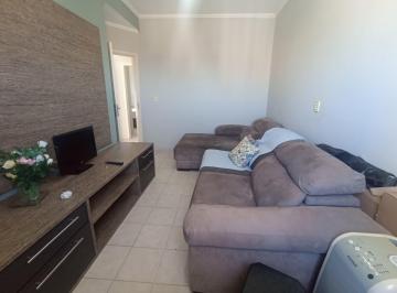 Sala · Apartamento à Venda nas Astúrias no Guarujá | QVista Inteligência Imobiliári...