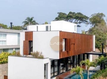 b22d75aee8cfce7487e2fe5e5c7ccdbf170a7e85 · Casa à Venda em Cacupé Florianópolis | 3 Suítes | Condomínio Frente Mar