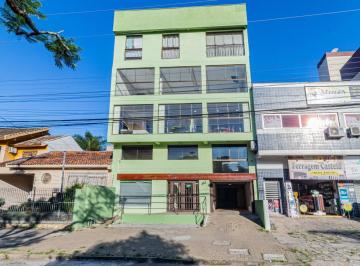 Casa · 1044m² · 2 Vagas · Oportunidade Única! Prédio Comercial em Localização Privilegiada em Porto Alegre
