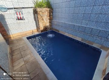 202604201134457966.jpg · CASA COM 2 DORMITÓRIOS, SENDO UMA SUÍTE, COM PISCINA, APENAS 300M DA PRAIA EM PRAIA GRANDE.