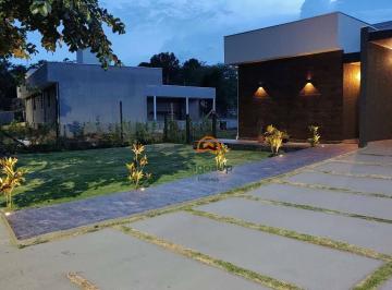 f30b29fdbe822f69a2e1dd3d6a3ea7e58ed350f6 · Casa com 4 dormitórios à venda, 180 m² por R$ 1.350.000,00 - Condomínio Estância das Aroeiras - Lago