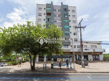 Comercial · 35m² · 1 Vaga · Sala com piso cerêmico, luminárias, persiana e banheiro.