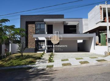 Casa · 600m² · 4 Quartos · 4 Vagas · Casa com 4 Suítes e Design Moderno em condomínio