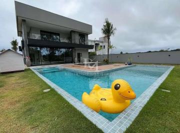 sc-florianopolis-ingleses-do-rio-vermelho-estrada-dario-manoel-cardoso-casa-sobrado-em-condominio-a-venda-4-quartos-6882b78f-1-17769542193871.webp · Casa com 4 suítes, piscina, elevador e área gourmet nos Ingleses. Alto padrão em condomínio completo