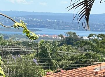 Casa de 5 quartos, Brasília · QI 27 do Lago Sul: Elegância, Conforto e Vista Privilegiada na Ponta Seca