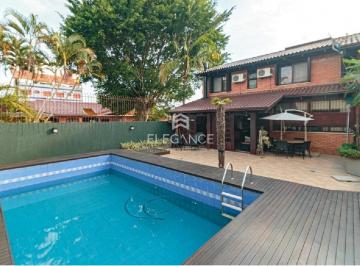 Foto 01 · Casa para comprar no Jardim Planalto com 330 m2 privativos, 3 dormitórios, suíte, pátio generoso com
