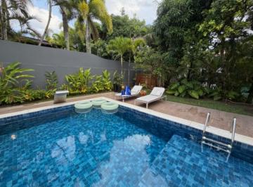 Foto 04 · CASA À VENDA EM ALPHAVILLE SALVADOR I R$ 6.350.000,00 PISCINA, ÁREA GOURMET, JARDIM, 5 SUÍTES, 2 CLO