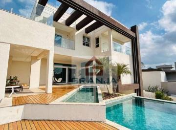 bdab231fc3bda400562b978f745ad0addf6835c6 · Casa mobiliada de alto padrão à venda no Reserva Santa Maria em Jandira | 4 suítes, 2 piscinas, 557 