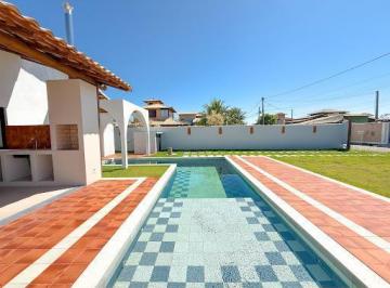 09fba3888a5833e47d4c6bd4cd40b16e12e35ca5 · Casa com 3 dormitórios à venda, 138 m² por R$ 1.400.000,00 - Caravelas - Armação dos Búzios/RJ
