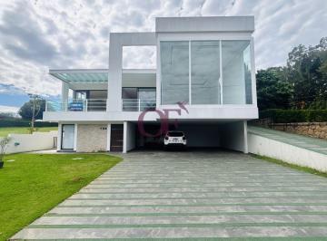 Casa · 707m² · 5 Quartos · 9 Vagas · Casa de Frente para o Lago no Portal da Concórdia com 5 Suítes Master