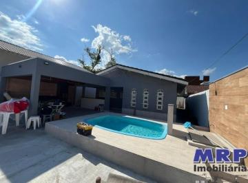 Foto 01 · Casa a venda em Ubatuba na Praia da Maranduba. Com piscina. Porteira fechada. Aceita financiamento.