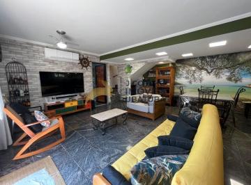 Foto 01 · casa 4 dormitorios na Praia da enseada em Ubatuba-SP.