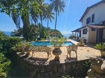 Casa · 345m² · 5 Quartos · 4 Vagas · Casa dos Sonhos em Ilhabela: Sofisticação à Venda