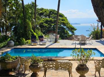 Casa · 345m² · 5 Quartos · 4 Vagas · Casa dos Sonhos em Ilhabela: Sofisticação à Venda